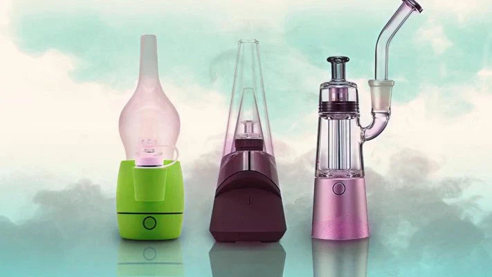 three vaporizers against a light, abstract background