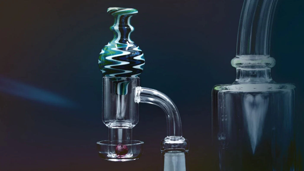 colorful glass dab rig with a spiral patterned top